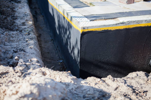 Professional Waterproofing technician working in Miller Place, NY